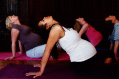 Photograph of women doing prenatal yoga