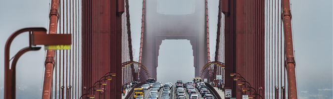 Photograph of crowded lanes of traffic crossing the Golden Gate Bridge in San Francisco