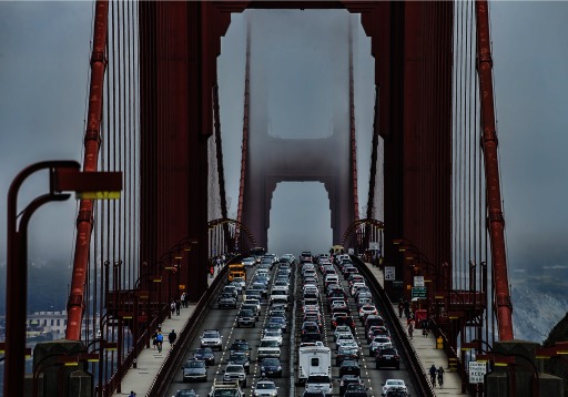 Photograph of crowded lanes of traffic crossing the Golden Gate Bridge in San Francisco