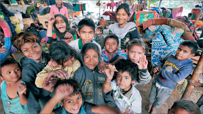 Editorial use only Children in a slum in New Delhi, India. Photographed in 2019.