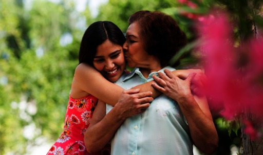 Photograph of a woman and her granddaughter outdoors