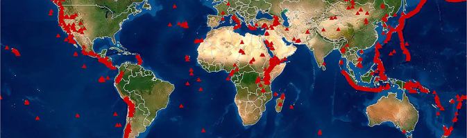 A world map with locations of volcanoes marked.