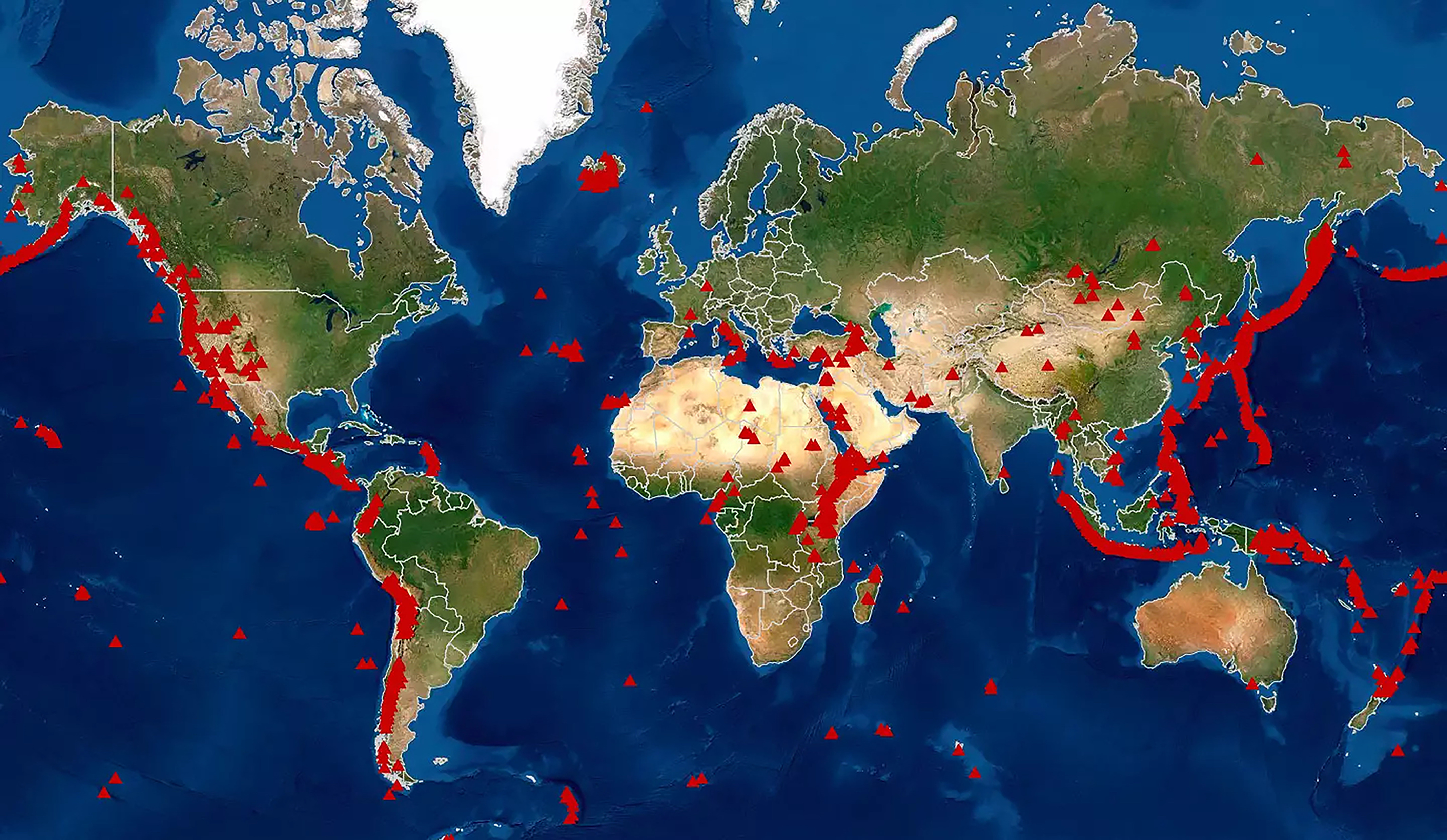 A world map with locations of volcanoes marked.