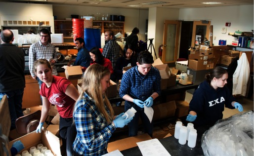 Photograph of students assembling kits.