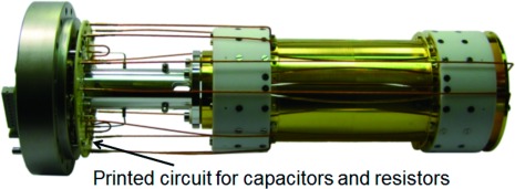 Fig. 4. View of ICR cell with dynamic harmonization (lab prototype). Gold plated copper, macor insulator. Printed circuit ceramic board as interface board instead of free wired elements.