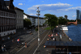 Figure 5 is an image of Mainkai Street, Frankfurt, during the COVID-19 pandemic in 2020, displaying the increase in pedestrian and bicycle activity.