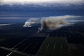 Aerial image of smoke plumes rising from burning sugarcane fields in South Florida