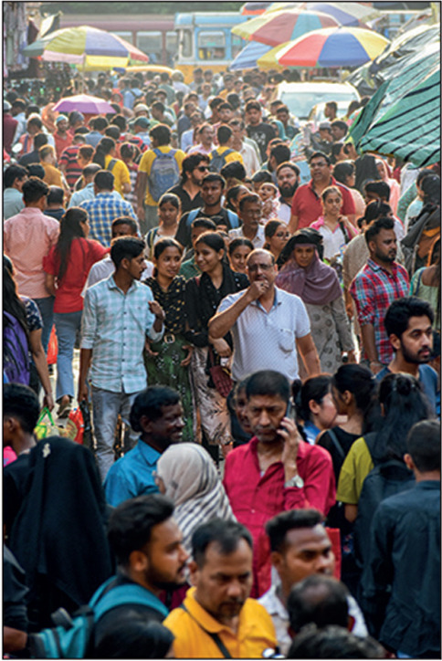 A crowded market place as seen in Kolkata , India , on 28 April 2023 . India is said to become world's most populous country by the end of April, hitting almost 1.43 billion people and eclipsing China according to United Nations report. (Photo by Debarchan Chatterjee/NurPhoto via Getty Images)