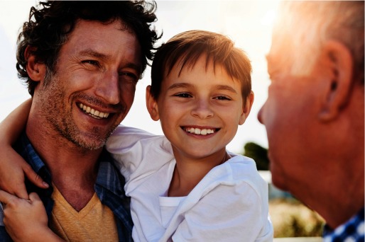 Photograph of a grandfather, father, and son