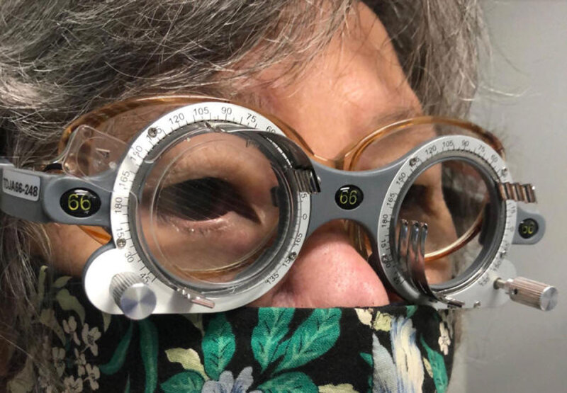 Obliquely placed plastic Fresnel ring prism (The Fresnel Prism and Lens Company, Eden Prairie, MN), shown base up and in at 80 degrees on the right in 66 mm trial frames over the patient’s habitual spectacles
