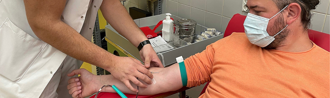 A man giving a blood sample