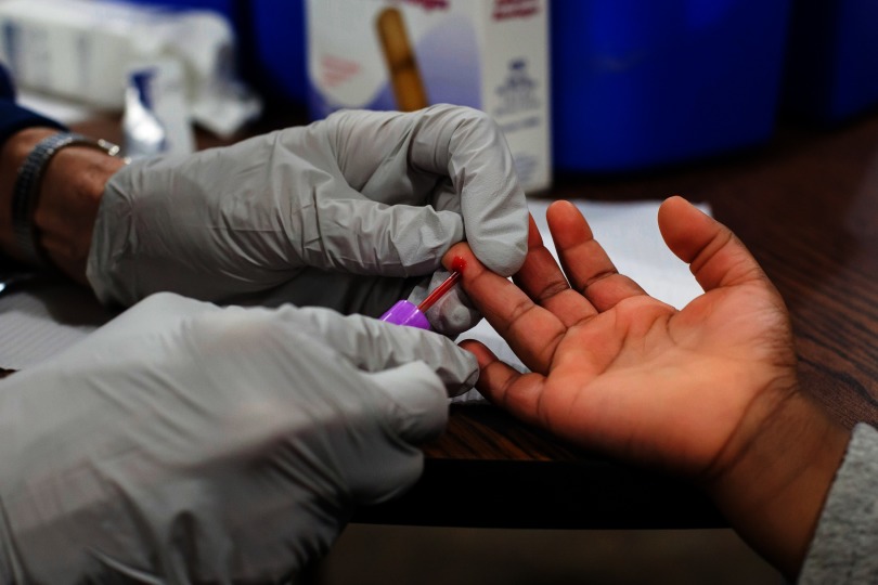 Photograph of a child having his blood lead tested.