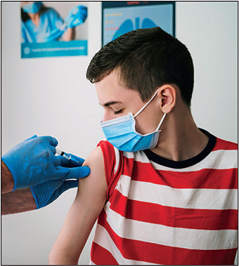 Patient Getting Vaccinated against COVID-19. Child, teenage boy vaccination. Coronavirus epidemic. Copy space.